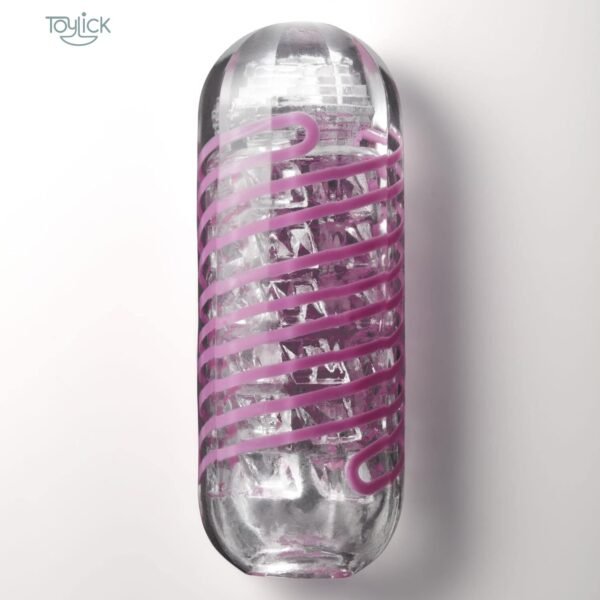 Close-up of the TENGA Spinner SPN-006 (Brick) with its clear, thick casing, pink spiral band, and internal diamond-shaped texture.