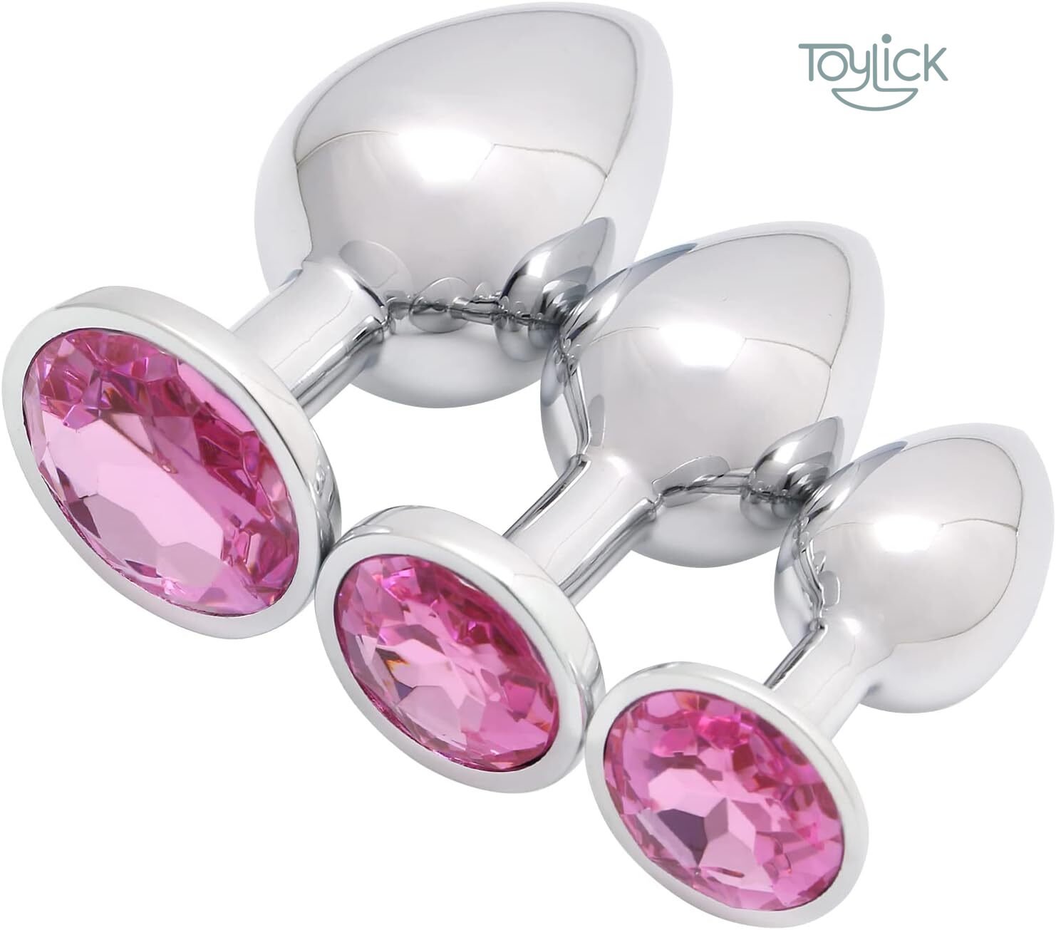 luxury-jewel-butt-plug-3-pieces-collection-toylick-main A set of three chrome-colored, jeweled butt plugs by Toylick, arranged in descending size order against a white background. Each plug features a large, faceted pink crystal on its base.