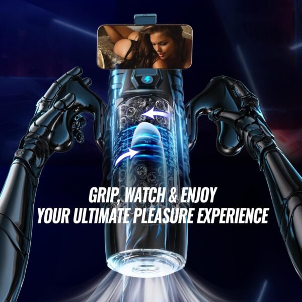 Lifestyle image of the black Thrust Master Pro Male Stroker by ToyLick, held by two black, robotic-style arms, with a smartphone mounted on top displaying adult content. Text reads: "GRIP, WATCH & ENJOY YOUR ULTIMATE PLEASURE EXPERIENCE." The internal mechanism glows bright blue with motion arrows.